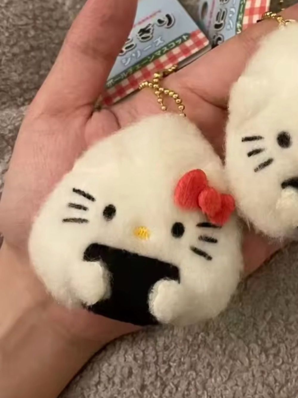 Hello Kitty White Plush Onigiri Bag Charm with Red Bow and Gold Chain